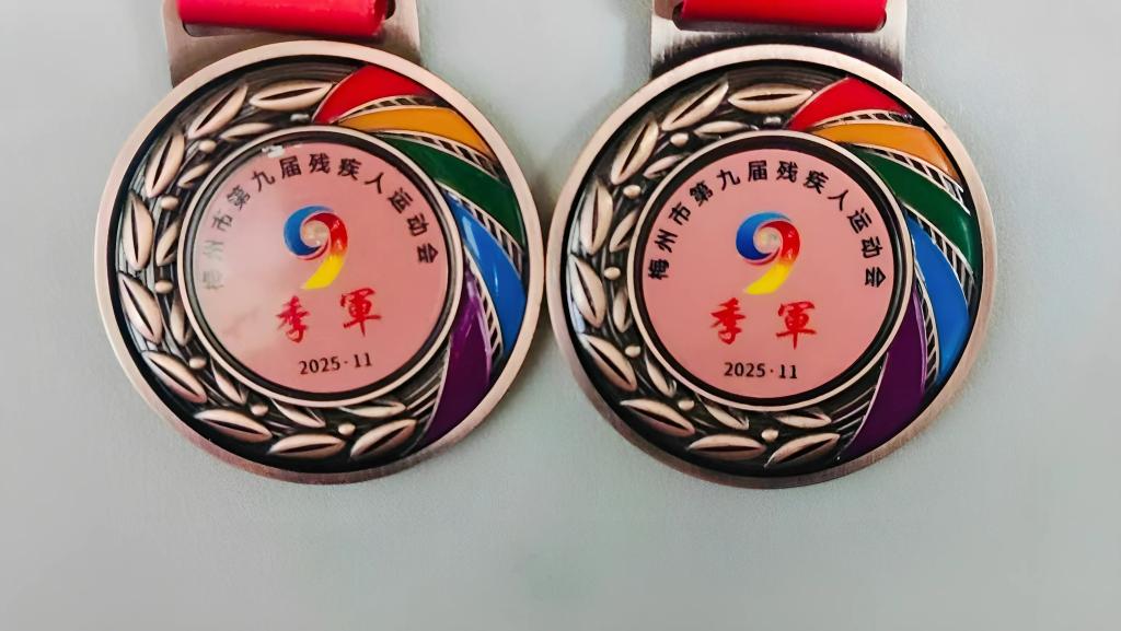 我校学子在梅州市残疾人运动会勇夺2金2银3铜6.jpg